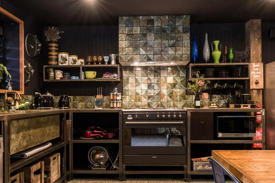 moody industrial kitchen with bespoke concrete benchtops and hand-made double sinks