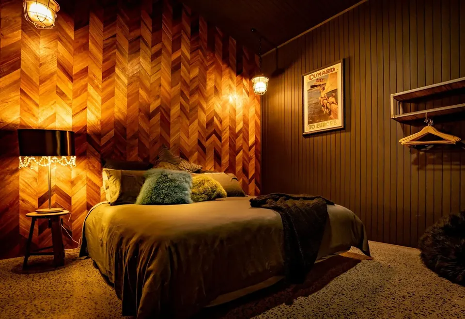 chevron parquetry with antique hanging lights sourced from europe