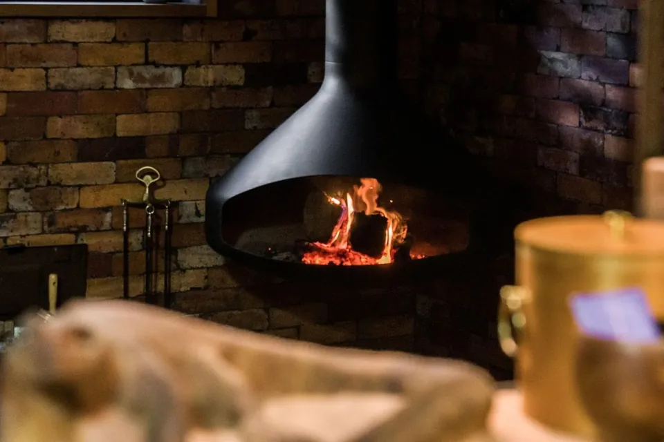the fire turning slowly as the room warms